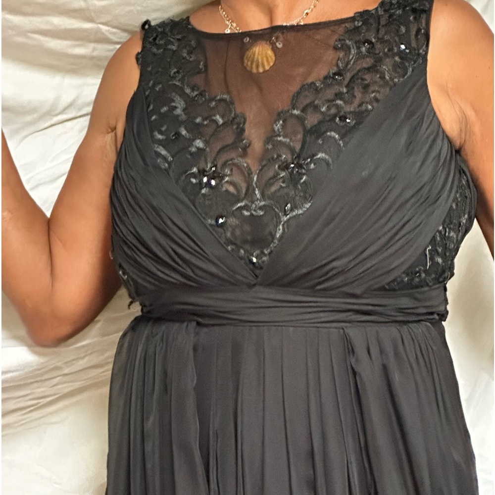 Black silky gown with train.